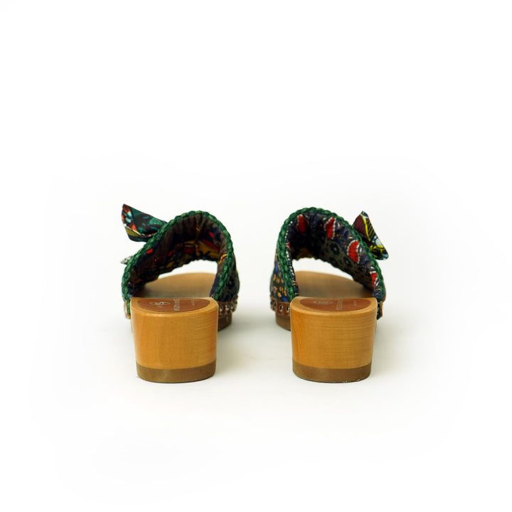 Roberta Gandolfi Lola Sabot sandali in legno con rafia e pelle di vitello con fiocco stampa african Offerta