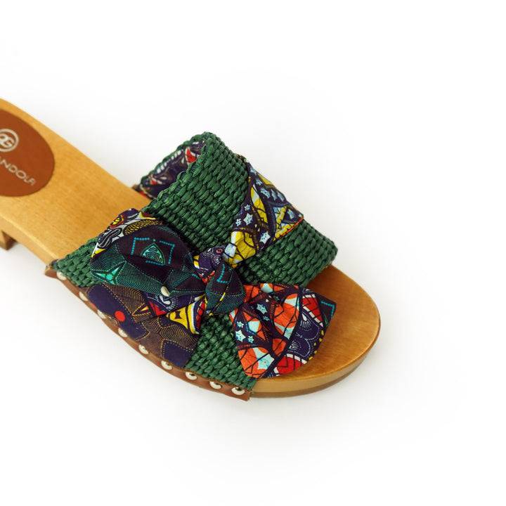 Roberta Gandolfi Lola Sabot sandali in legno con rafia e pelle di vitello con fiocco stampa african Offerta
