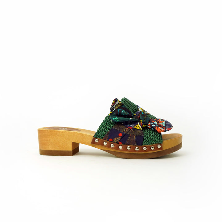 Roberta Gandolfi Lola Sabot sandali in legno con rafia e pelle di vitello con fiocco stampa african Offerta