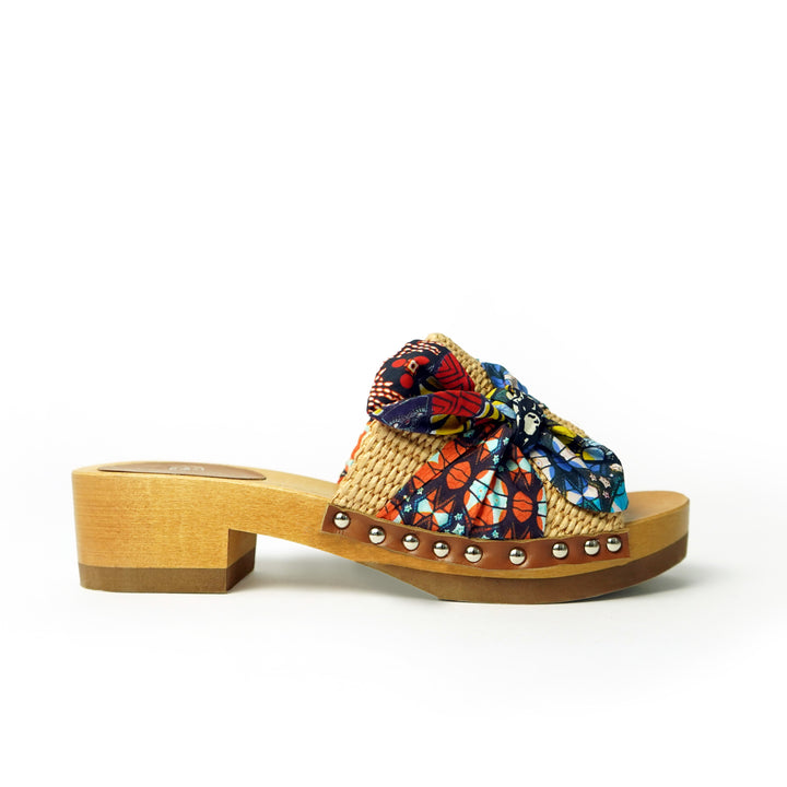 Roberta Gandolfi Lola Sabot sandali in legno con rafia e pelle di vitello con fiocco stampa african Vendita Calda