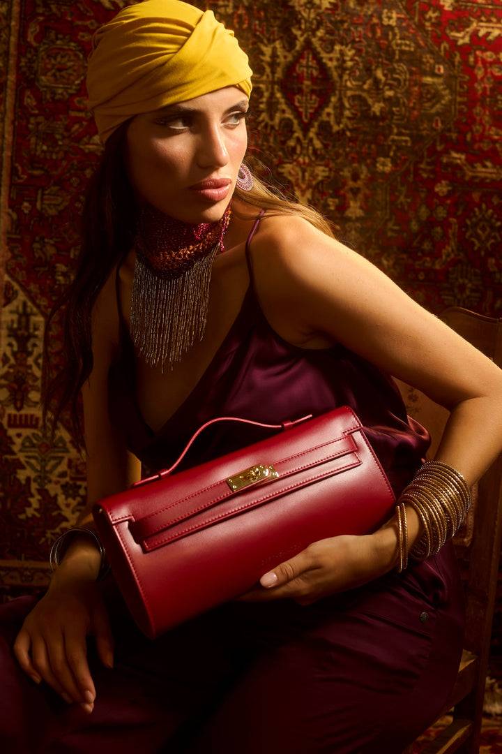 Roberta Gandolfi Jade cluch borsa in pelle con chiusura manico retrattile e tracolla staccabile e regolabile Vendita